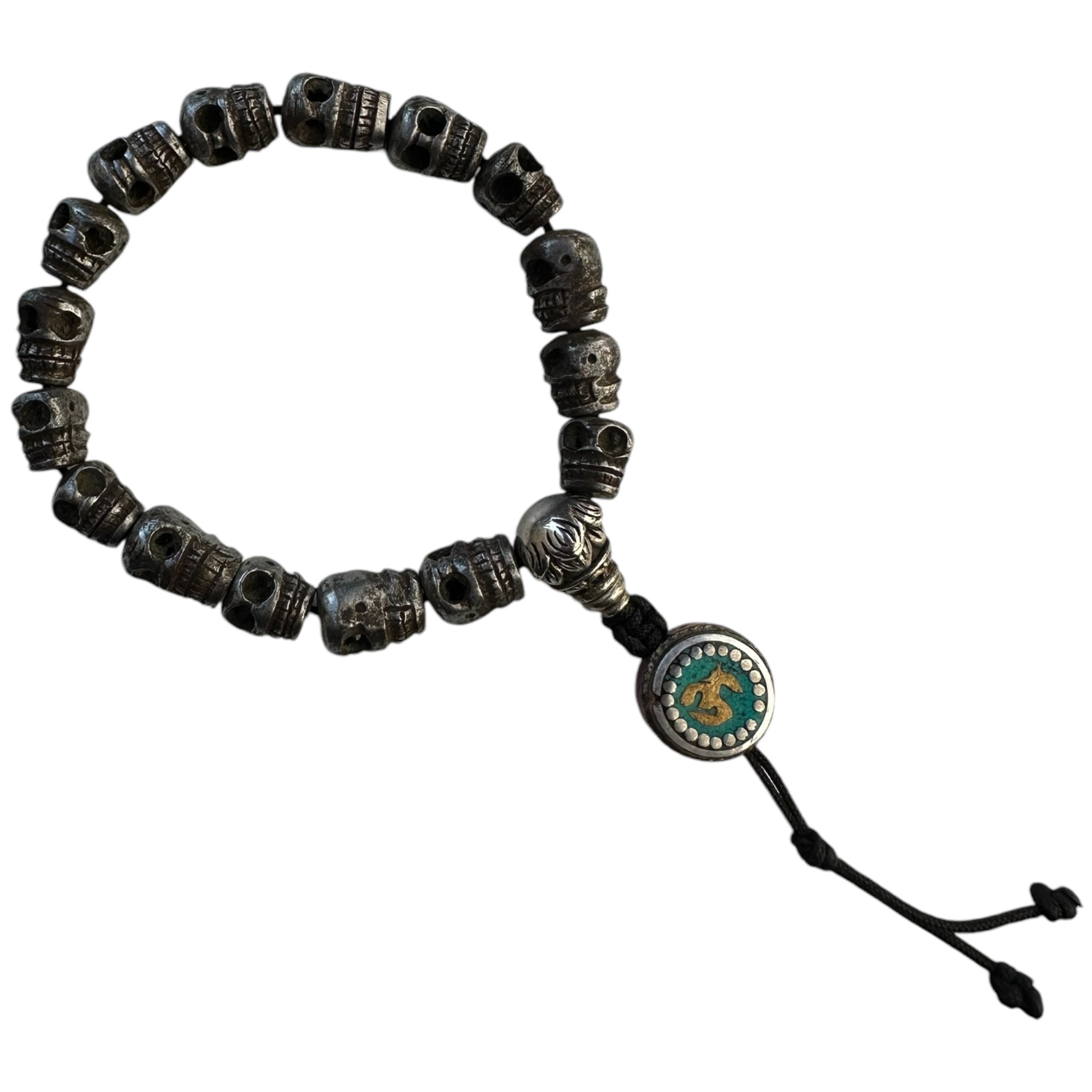 Handmade Carved Metal Skull Bracelets with Om guru bead